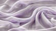   A close-up of white and purple fabric with wave designs on top and bottom