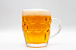 Cup of beer on white background
