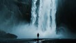 A figure standing at the base of a waterfall, feeling the power of nature