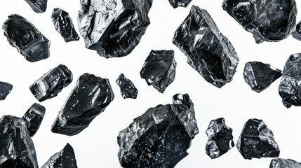 Detailed close-up of sharp obsidian fragments suspended in air.