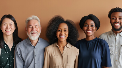 Individuals of different ages and backgrounds smiling warmly at the camera from a waist-level perspective against a neutral backdrop, radiating positivity and joy.