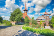 Amazing  summer scene of Iulia Alba town and Old wooden Michael the Brave church
