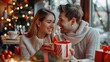 © Nijat - Young couple in love celebrates Valentine's Day. A man and a woman are enjoying time together in a restaurant, giving gifts, relaxing. Concept of romance, love
