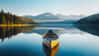 Calm lake, small canoe, clear morning sky, beautiful mountains