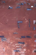 茶色い壁のテープを剥がした跡の抽象的な模様、背景素材