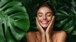 A woman with her hands on the sides of her face smiling, Concept of relaxation, as the woman is enjoying her time in natural environment. A woman and monstera a commercial shoot for a skincare brand