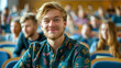© Keitma - Portrait of a blond hair nordic caucasian happy university student sitting in a college lecture hall
