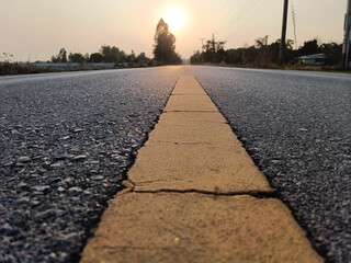 Yellow lines on paved road