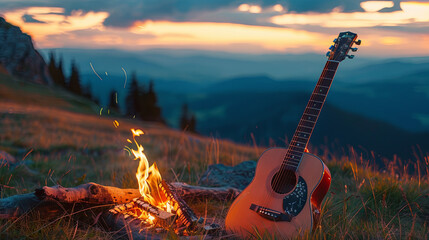 Wall Mural - Romantic atmosphere in the mountains around a campfire with a guitar at sunset