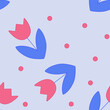 Red and blue floral ornament. Tulips and polka dots isolated on a pastel blue background. Flat style. Seamless pattern. Background for cover, textile, dishes, interior decor. 