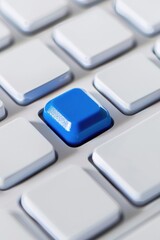 Poster - Computer keyboard with a blue button. Suitable for technology concepts