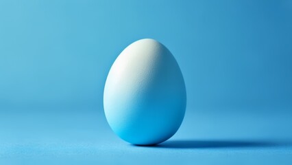 Poster -  A single blue egg a symbol of new beginnings