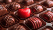 A sweet red heart on a box of chocolate candies.