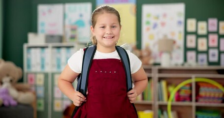 Wall Mural - Smile, face and child in classroom for education, learning and ready for morning kindergarten. Happy, school and portrait of girl or student with knowledge, studying and pride for academic lesson