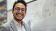 © NickArt - Latino or hispanic person data analyst standing in front of whiteboard with graphs and charts explaining business strategy