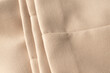 Close up of beige soft fabric texture ,Abstract kinitted fabric in neutral colour