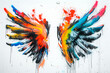Two painting wings covered in vibrant colorful splatters on a white wall. Grunge and graffiti style. Design element