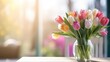 Beautiful bouquet of tulips in glass vase on wooden table. blurred background. Copy space