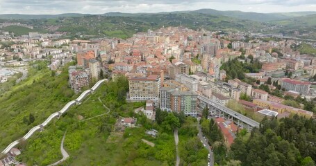 Wall Mural - Aerial view of the equipped bridge that crosses Potenza, in Basilicata, Italy. It is a long system of escalators and an important infrastructure of the city.