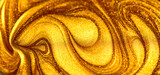 Fototapeta  - Beautiful abstract golden liquid paint background, beauty gold backdrop texture. Metallic gold paint, art design. Yellow shimmering surface close-up. Golden bright glitter texture, macro shot 