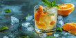 © Oleksandr - A refreshing citrus-infused cocktail served in a frosty glass, garnished with a twist of orange peel and sprig of mint, tempting the palate with zesty flavors