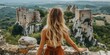 A blue-eyed blonde woman explores the ancient ruins of a castle nestled in the countryside, surrounded by stunning panoramic views