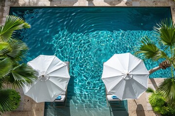 Canvas Print - White Umbrellas by Swimming Pool, top view 