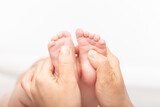 Fototapeta Perspektywa 3d - Baby Reflexology Foot Massage