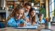 © Rattanathip - A family is sitting around a table doing homework together.