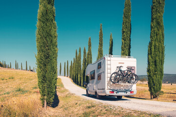 motor home on the road in italy, tuscany- travel, road trip, adventure concept