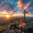 Christian cross on top of a mountain sunset landscape Easter wallpapers silhouette cross on Calvary mountain sunset background Easter Christmas concept.
