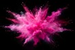 Pink powder explosion on black background