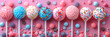 cake pops with colorful decorations on a pink background, top view, flat lay