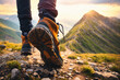 The legs of a woman traveler going in hiking sneakers shoes for cross-country travel. Back view. Highland with sun light on background.