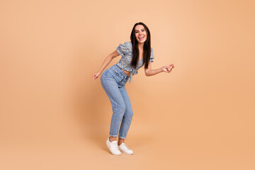 Sticker - Photo of crazy nice cheerful woman wear blue stylish clothes celebrate holiday event weekend isolated on beige color background