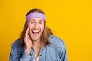 Canvas Print - Photo portrait of attractive young hippie man share secret cover mouth wear trendy denim outfit isolated on yellow color background