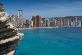 Fototapeta  - panorama of the Benidorm city (Spanish Manhattan) surrounded by rocks seen from the viewpoint - Balcó del Mediterrani. View also of the city beach - Platja de Llevant (Levante)