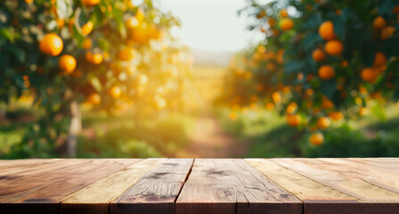 Wall Mural - Wood table top with blur of orange garden in the morning.For montage product display or design key visual layout