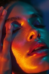 Wall Mural - facial massage, a models face relaxes and glows as a professional applies pressure points