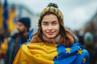 Woman in flag of EU and Ukraine on street. AI generative 