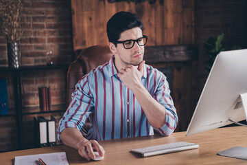 Wall Mural - Photo of nice young corporate man contemplate use computer wear striped shirt loft interior office indoors