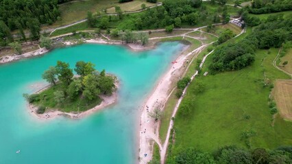 Canvas Print - Amazing beautiful turquoise lake Tenno in Trentino region of Italy, surrouded by Alps mountains. aerial drone view