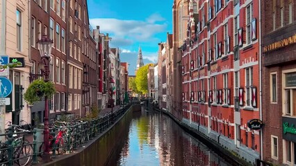 Wall Mural - Amsterdam autumn cityscape narrow old houses, canals, boats. High quality 4k footage