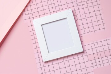 Poster - A picture frame placed on a pink surface, ideal for various design projects