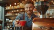 Smiling Barista Offering Coffee Cup