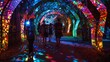 A group of people walking through a tunnel illuminated by vibrant colorful lights creating a mesmerizing atmosphere.