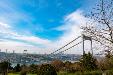 Wall Mural - Fatih Sultan Mehmet Bridge and cityscapa of Istanbul with partly cloudy sky
