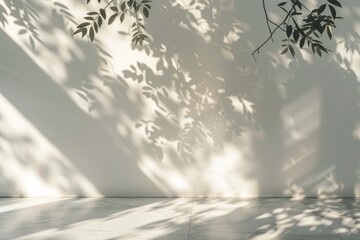 Poster - Trees shadow being cast on a wall, creating a contrast between the foliage and the light background