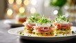 Potato nests with a plate of peas, ham and cream cheese on the festive Easter table