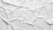 © Another vision - Close-up of a crumpled white paper texture, emphasizing the chaotic and intricate folds and creases.